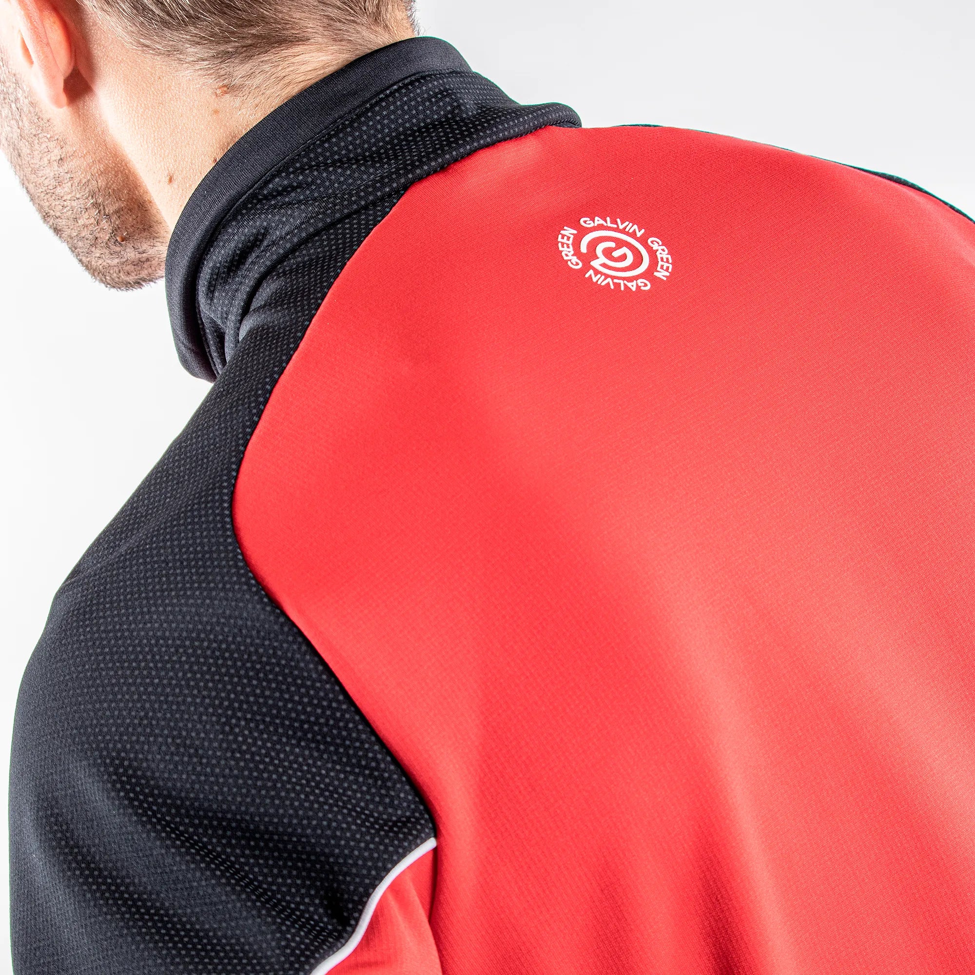 Daxton is a Insulating golf mid layer for Men in the color Red(7)