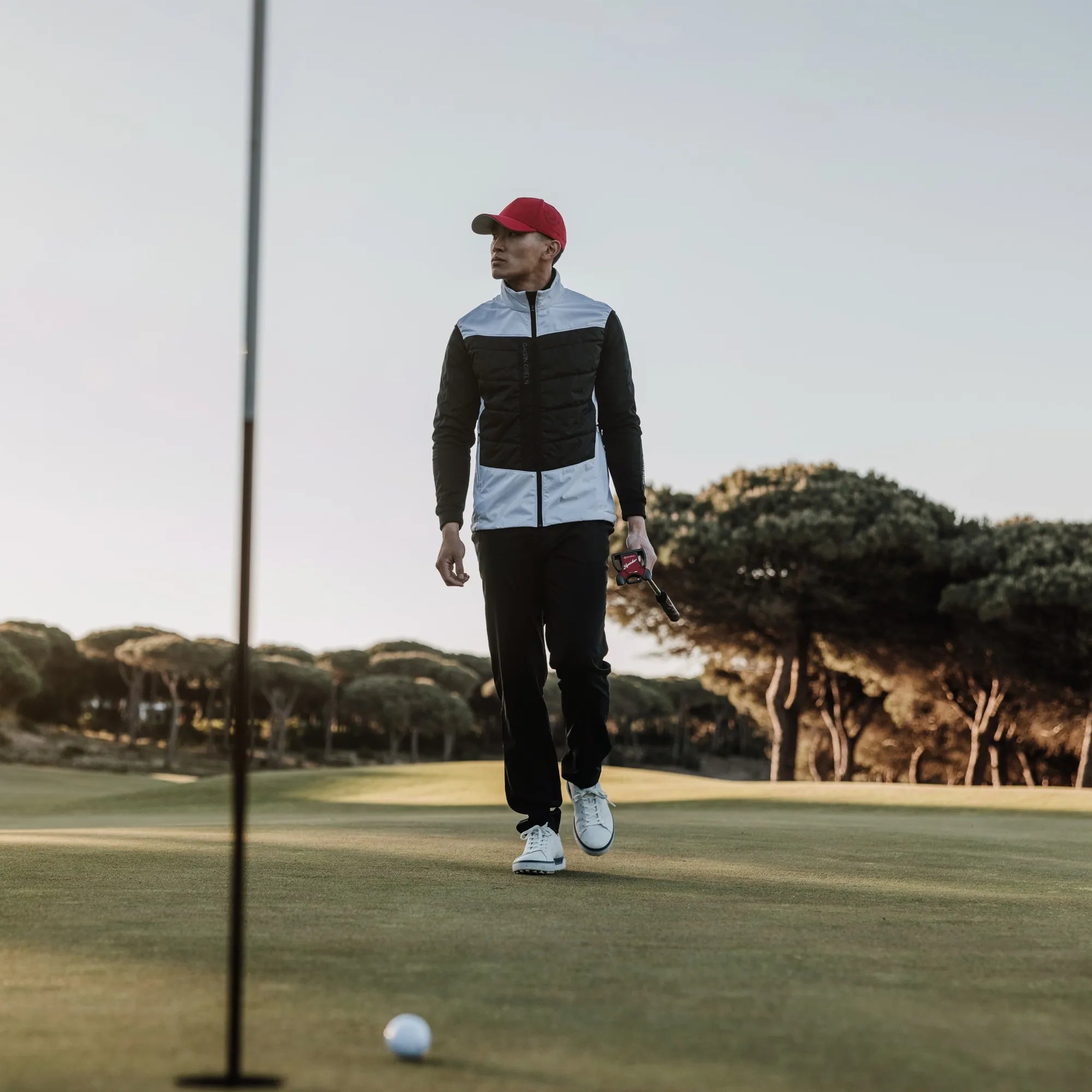 Lauro is a Windproof and water repellent golf vest for Men in the color White/Black(9)