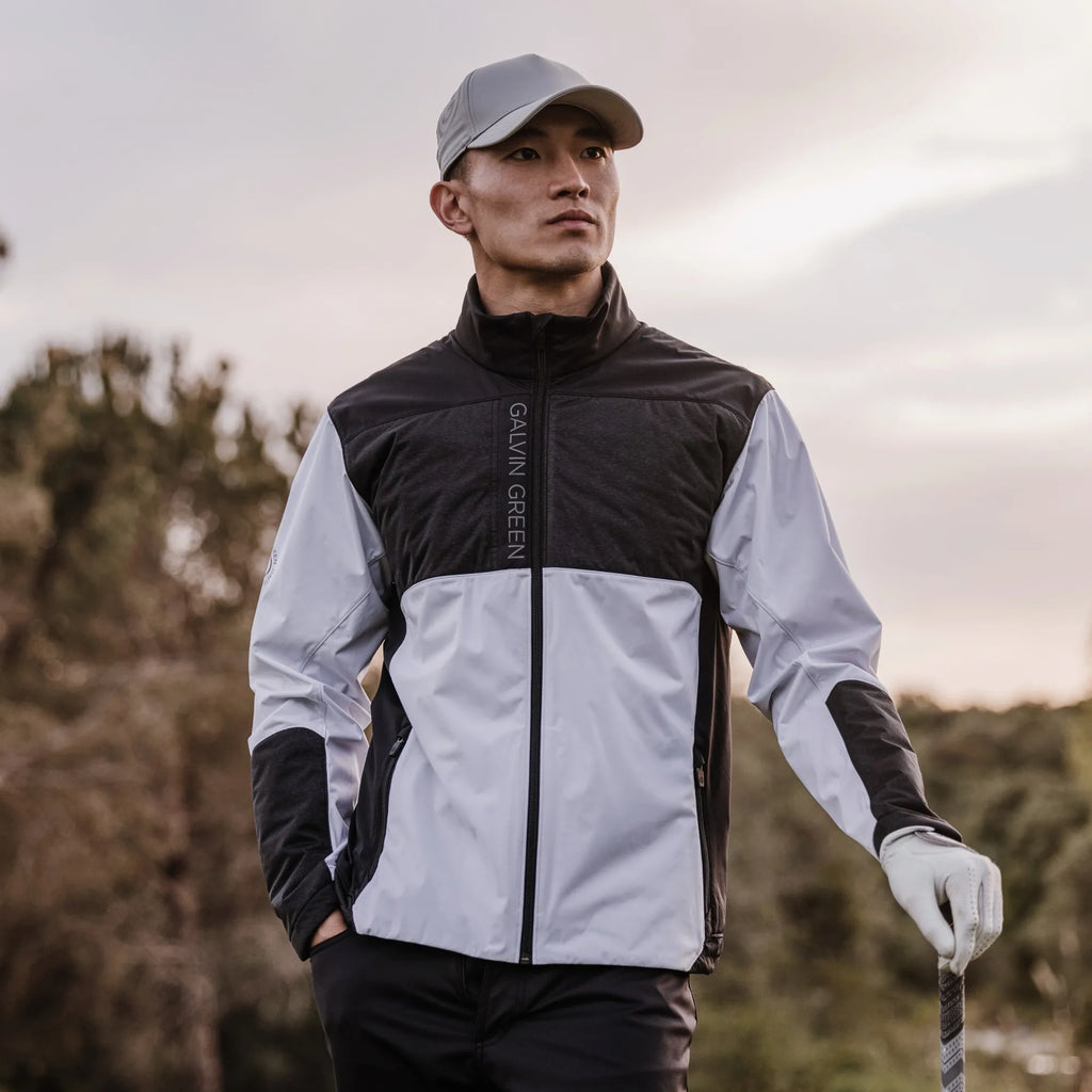 Layton is a Windproof and water repellent golf jacket for Men in the color White/Black(9)