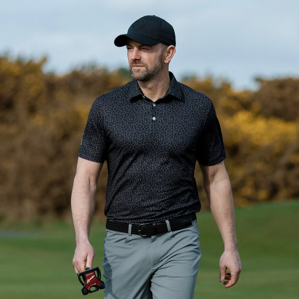 Mani is a Breathable short sleeve golf shirt for Men in the color Black(8)