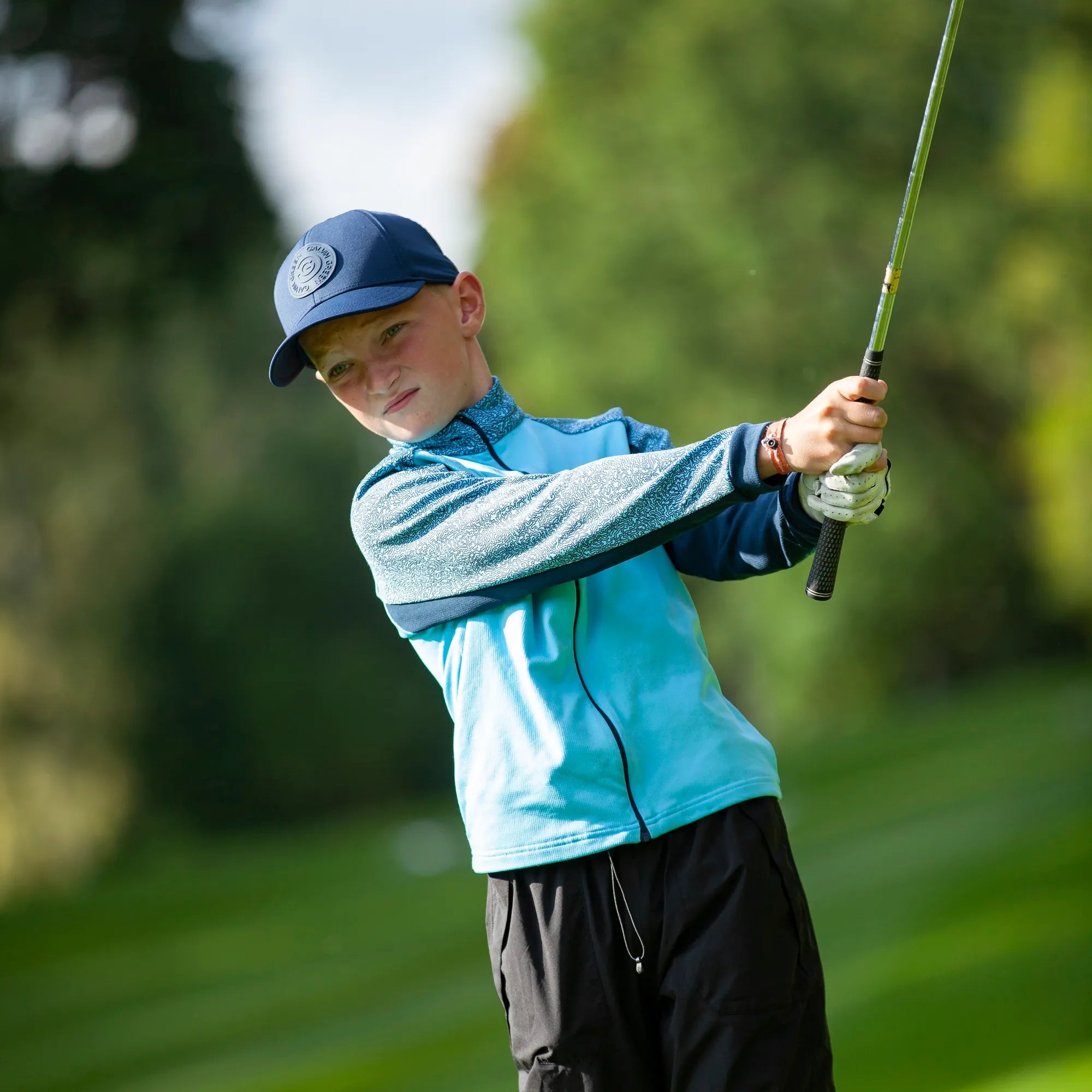 Rick is a Insulating golf mid layer for Juniors in the color Blue Bell(7)