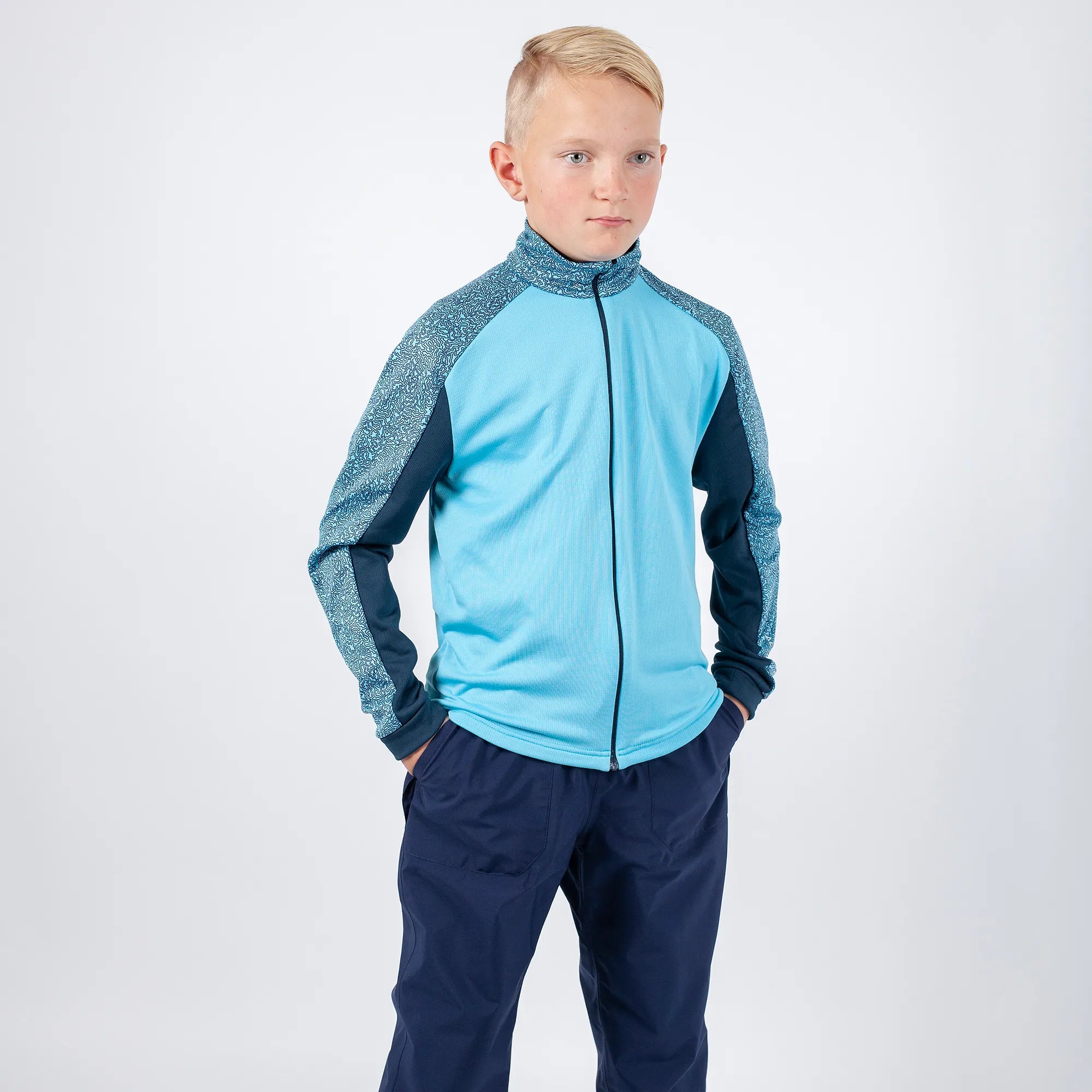 Rick is a Insulating golf mid layer for Juniors in the color Blue Bell(1)