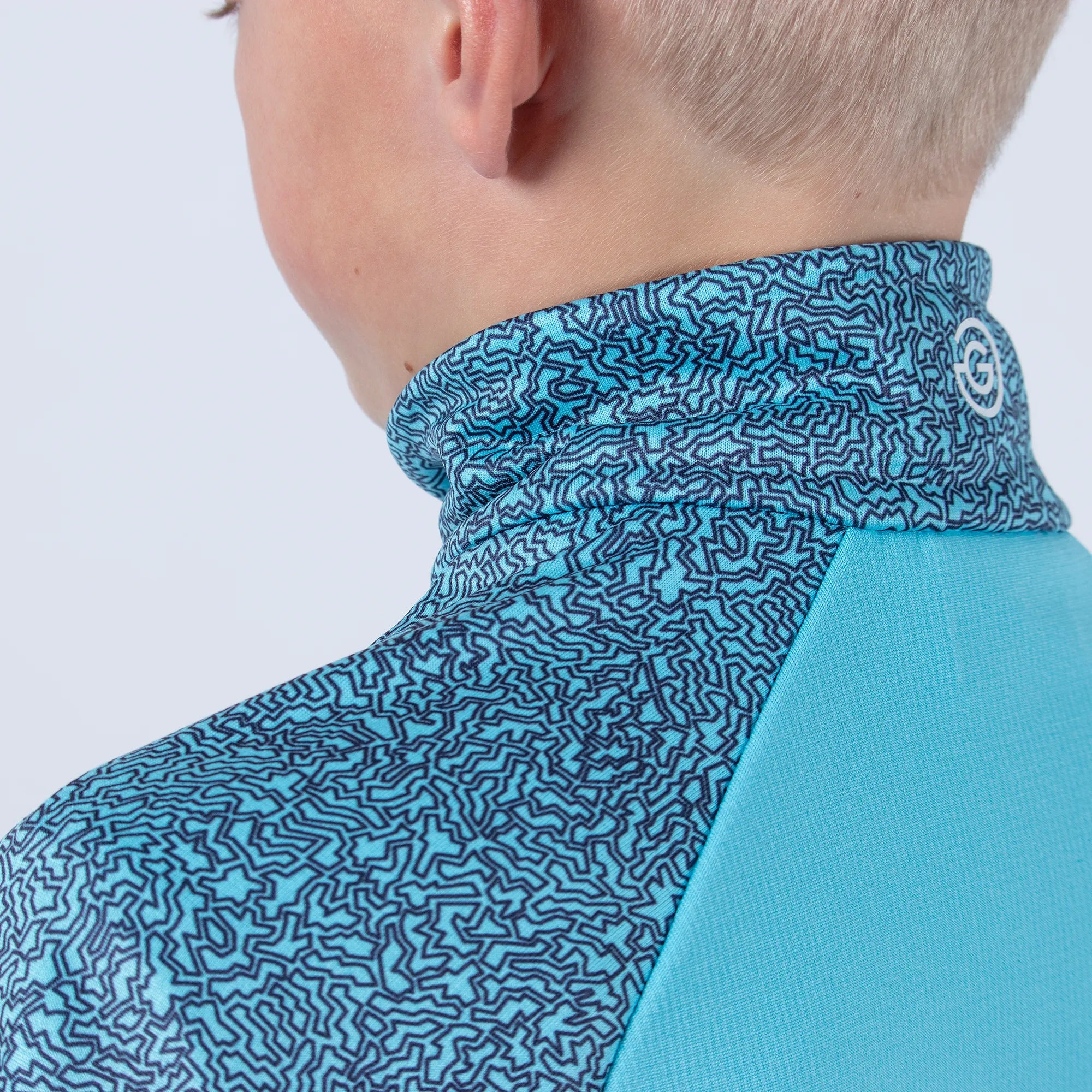 Rick is a Insulating golf mid layer for Juniors in the color Blue Bell(4)