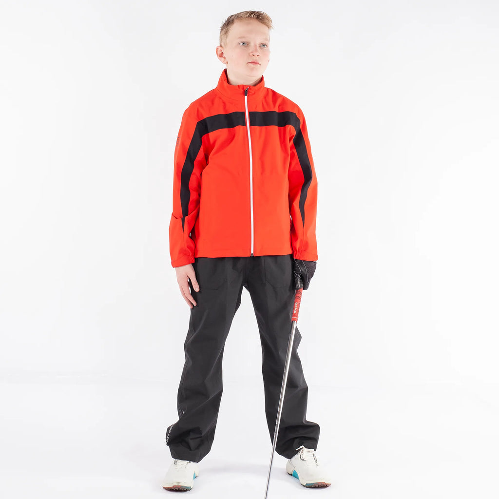 Robert is a Waterproof golf jacket for Juniors in the color Red(1)