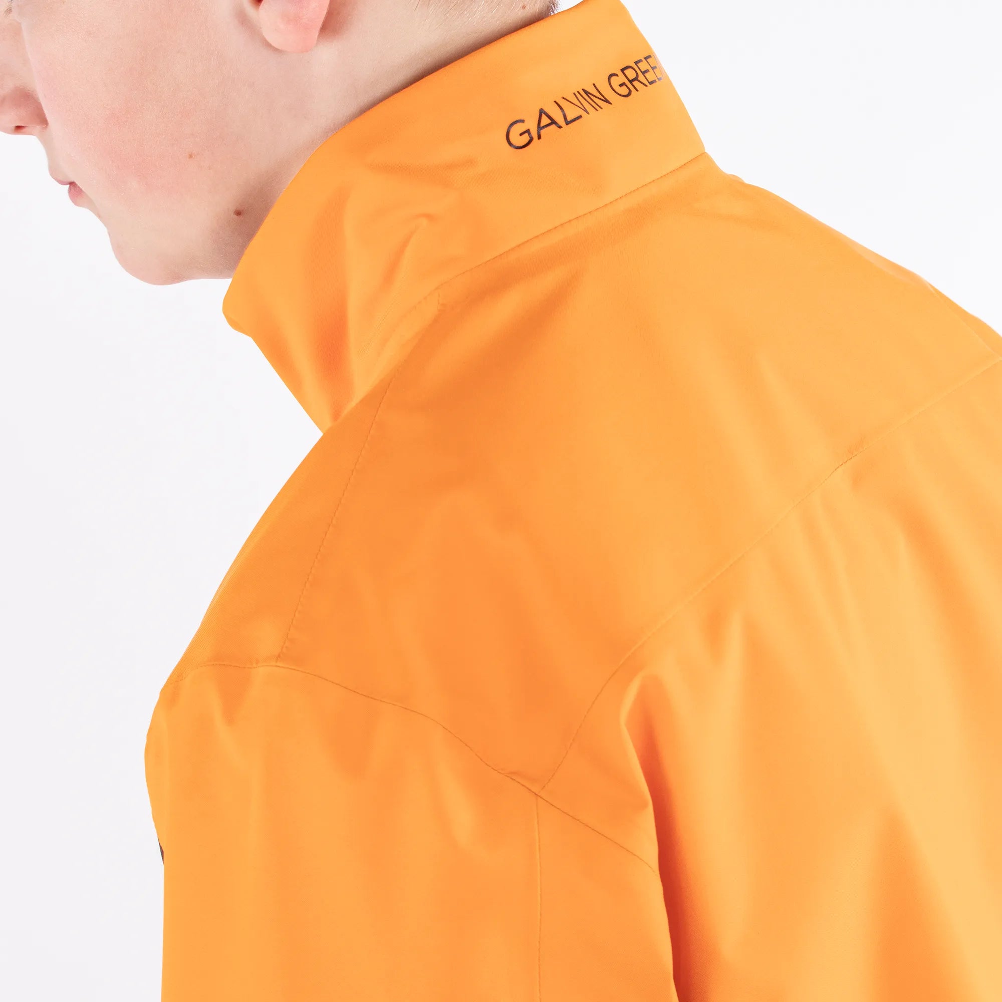 Robert is a Waterproof golf jacket for Juniors in the color Orange(5)