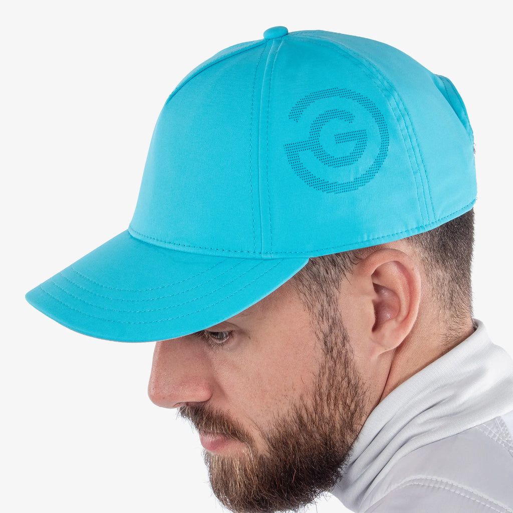 Sanford is a Lightweight solid golf cap in the color Aqua(2)